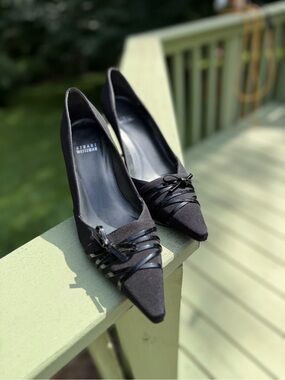 Classic black Stuart Weitzman pointy pumps with bow